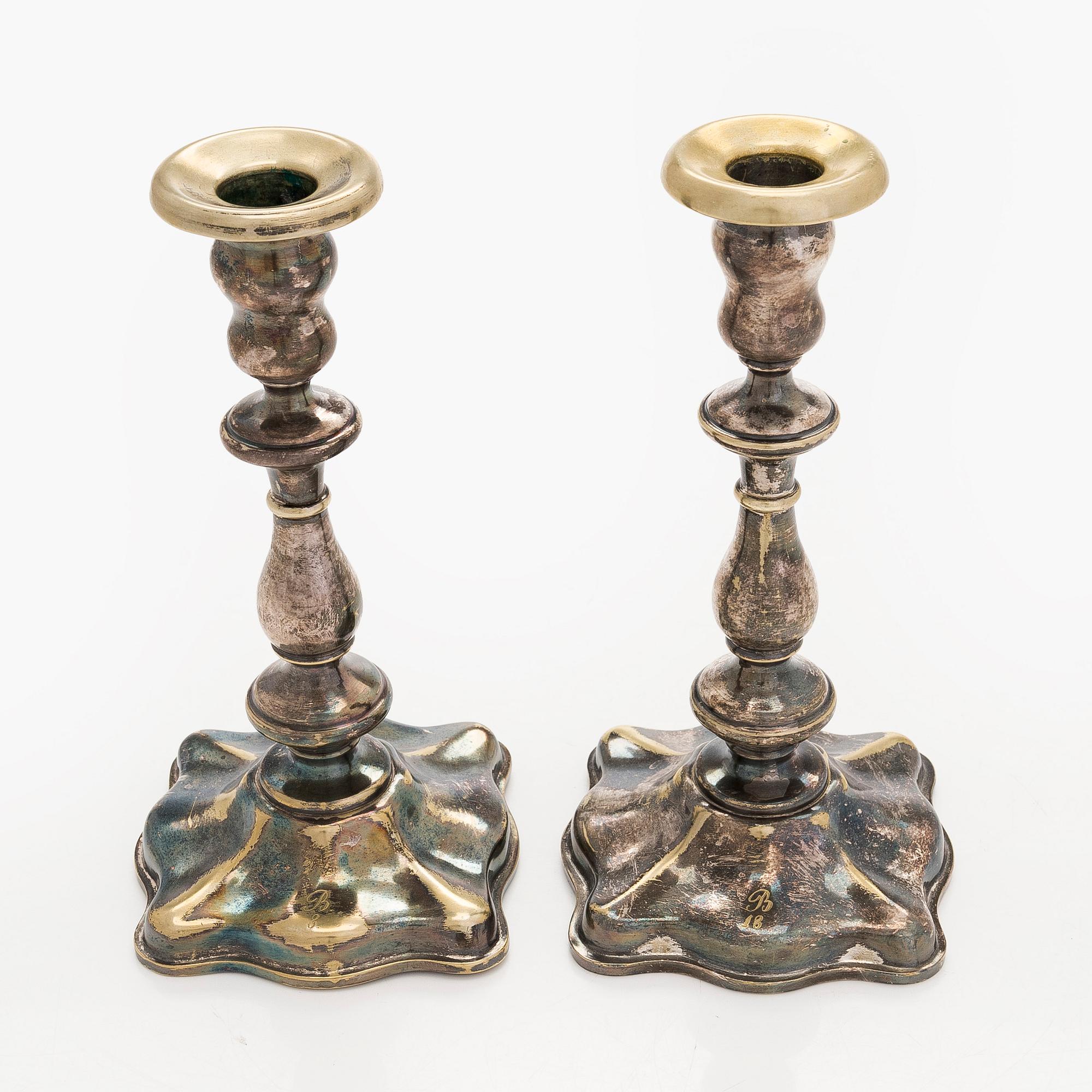 A pair of Fraget silver-plated candelsticks, Warsaw 1851-59.