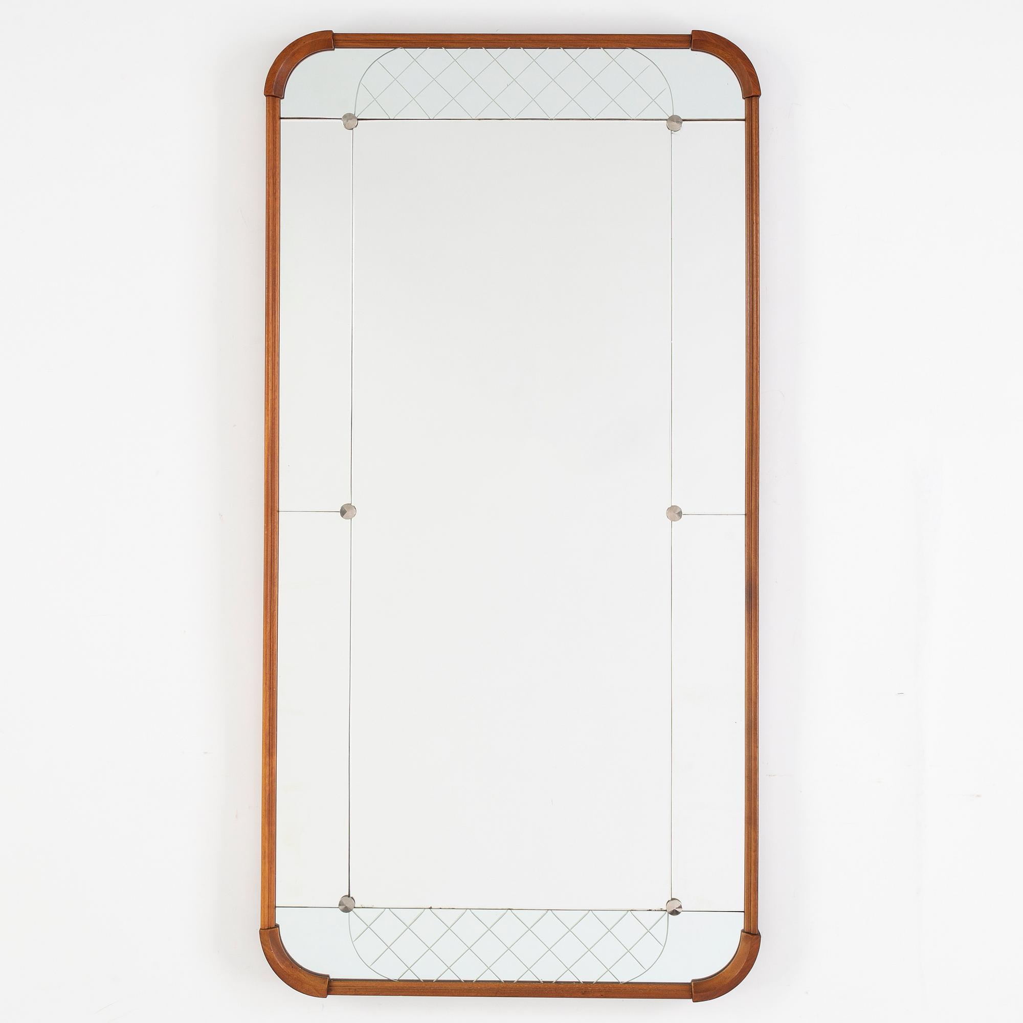 A teak veneered mirror.