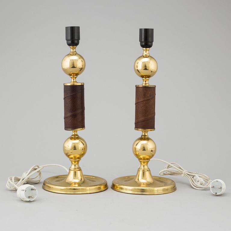 Two brass and leather table lamps, late 20th century.