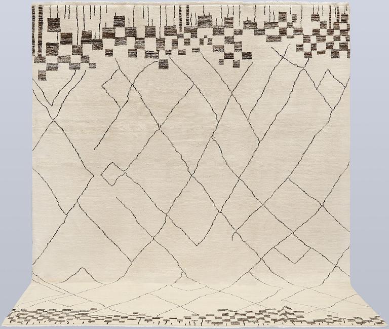 A Moroccan carpet, approx. 303 x 202 cm.