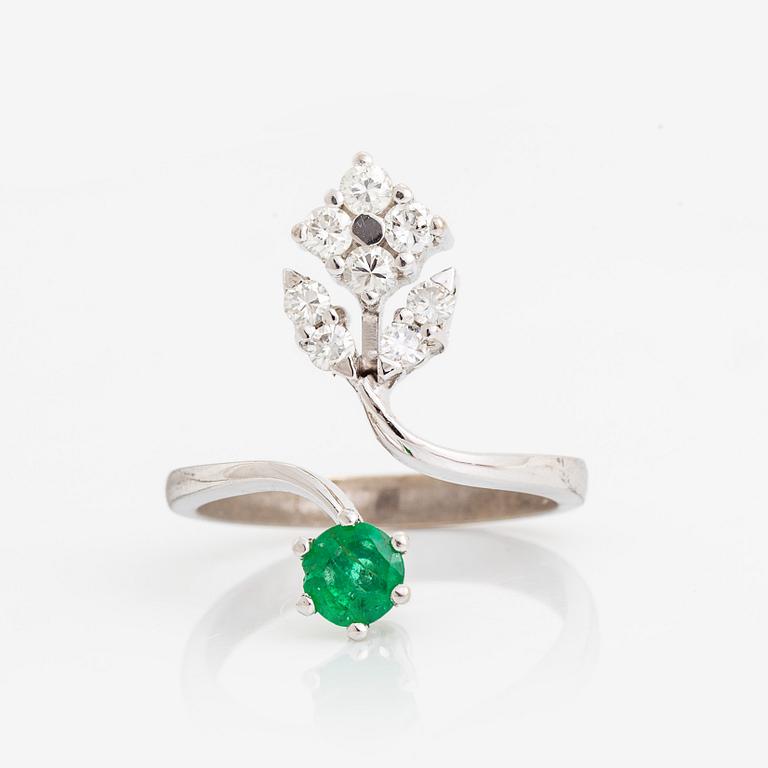 Emerald and brilliant cut diamond ring.