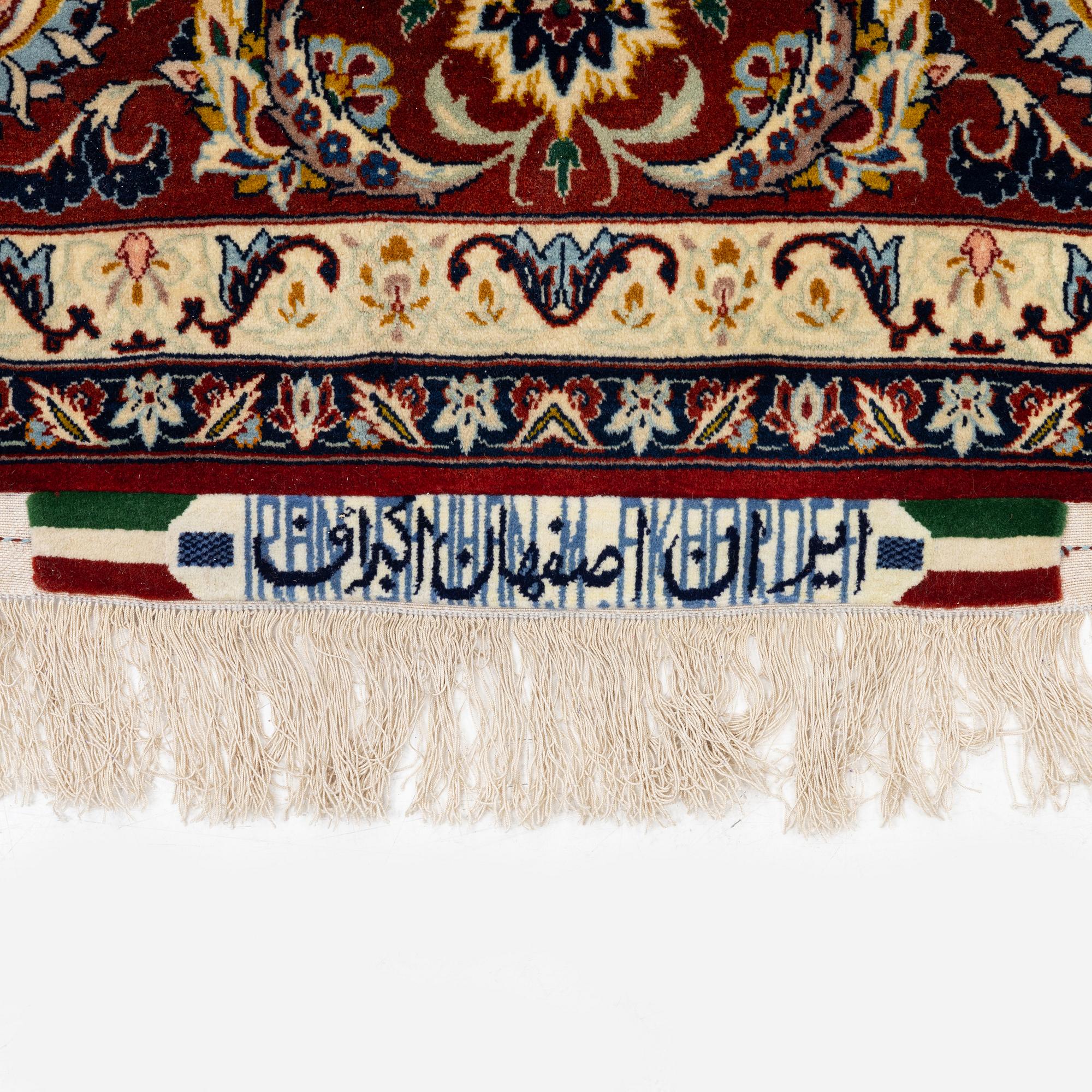 An Isfahan carpet, Central Persia, signed Akbaroff, c. 315 x 205 cm.