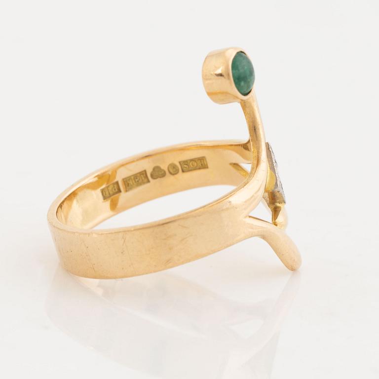 18K gold brilliant cut diamond and  cabochon cut emerald ring.