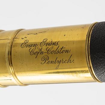 A 20th century telescope on a tripod.