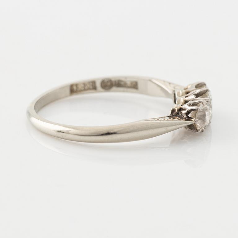 18K white gold and brilliant cut diamond three stone ring.