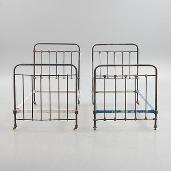 Two metal bed-frames from Nordiska Kompaniet, early 20th century.