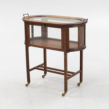 An oak tea trolley, early 20th Century.