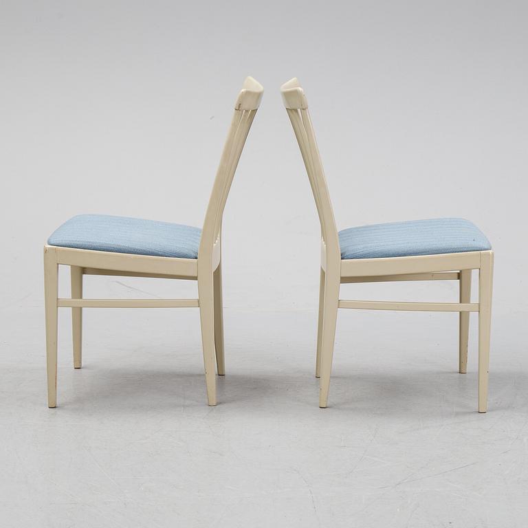 A dining table with six chairs by Carl Malmsten, second half of the 20th Century.