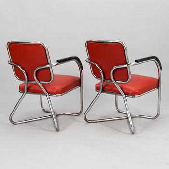 Two 1930/1940's armchairs / hairdressing chairs.