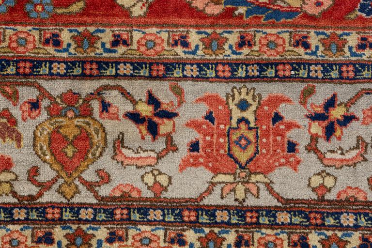 A oriental carpet, ca 320 x 223 cm.