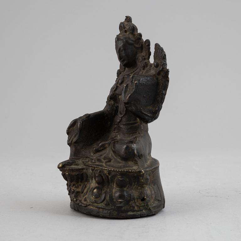 A Sino-Tibetan bronze figure of Green Tara, presumably 18th century.