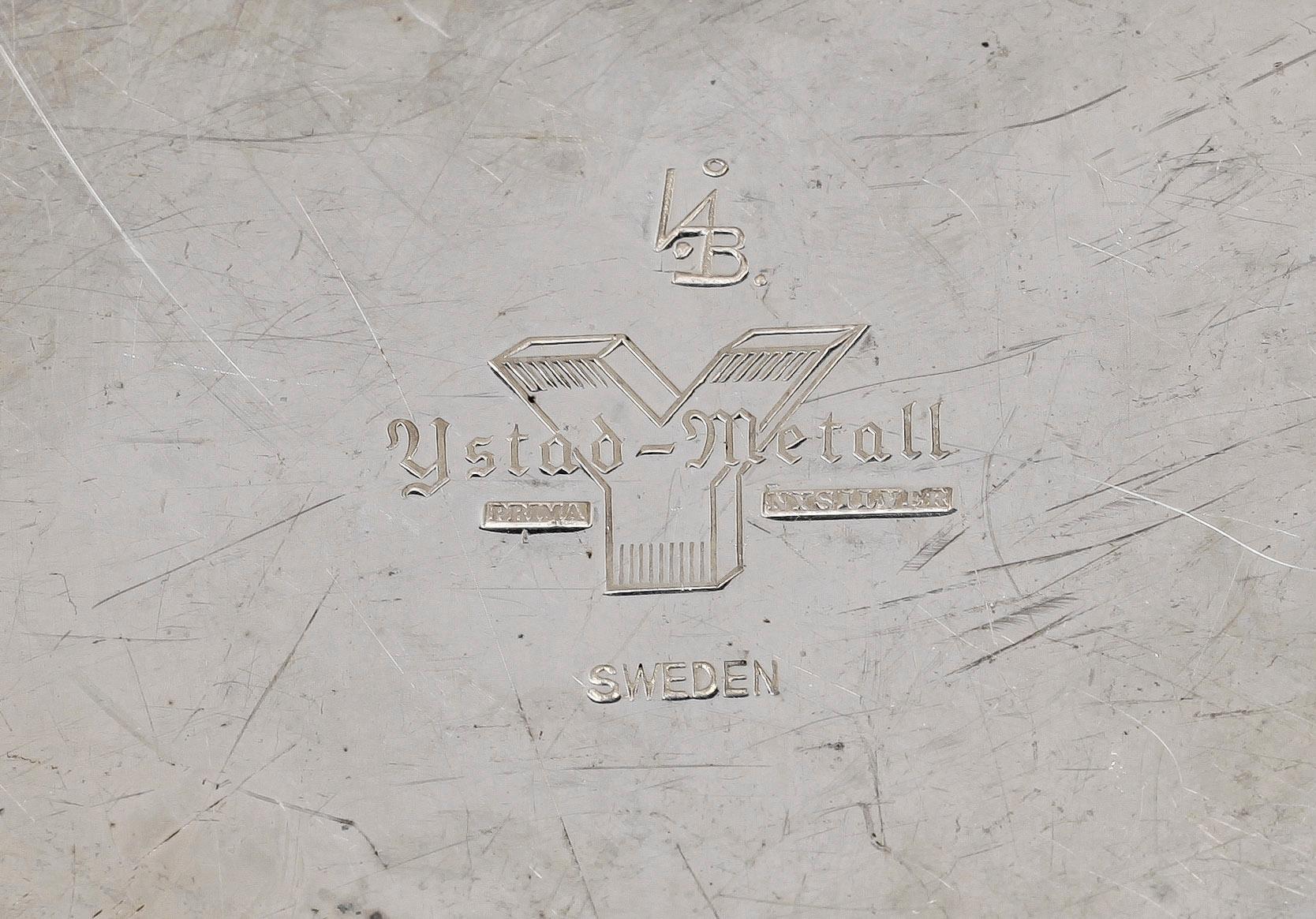 LJUSSTAKAR, ett par, nysilver, "Liljan", Ivar Ålenius Björk, Ystad metall, 1900-tal.