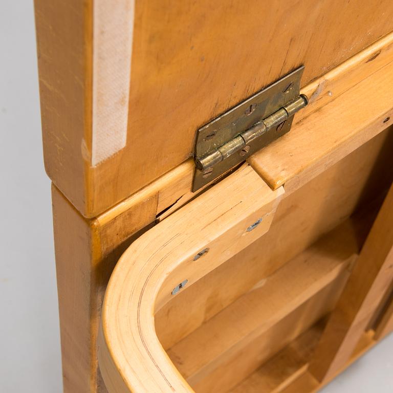 Alvar Aalto, a mid 20th century 'DL85' folding table, seven chairs for Artek.