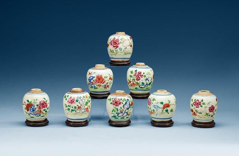 A matched set of eight famille rose tea caddys, Qing dynasty, ca 1800.