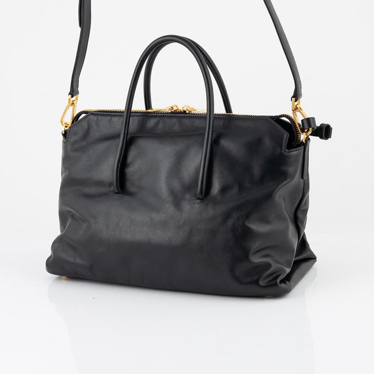 Miu Miu, a black leather handbag.