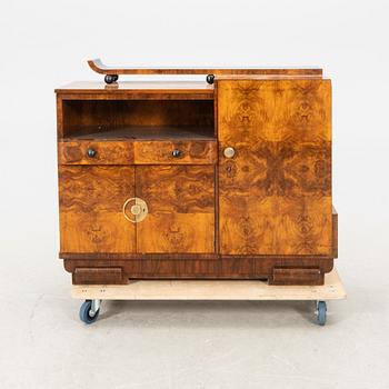 A walnut veneered Art Déco cabinet.