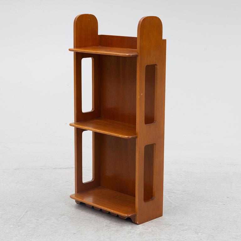 Josef Frank, a model 2085 wall shelf for Firma Svenskt Tenn.