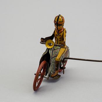 A tinplate Huki roundabout motorcycle, Germany, 1930s.
