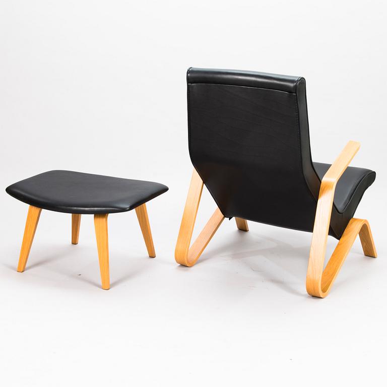 EERO SAARINEN, fåtölj samt fotpall, "Grasshopper", licenstillverkad av Tetrimäki Finland.
