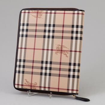 An ipad case by Burberry.