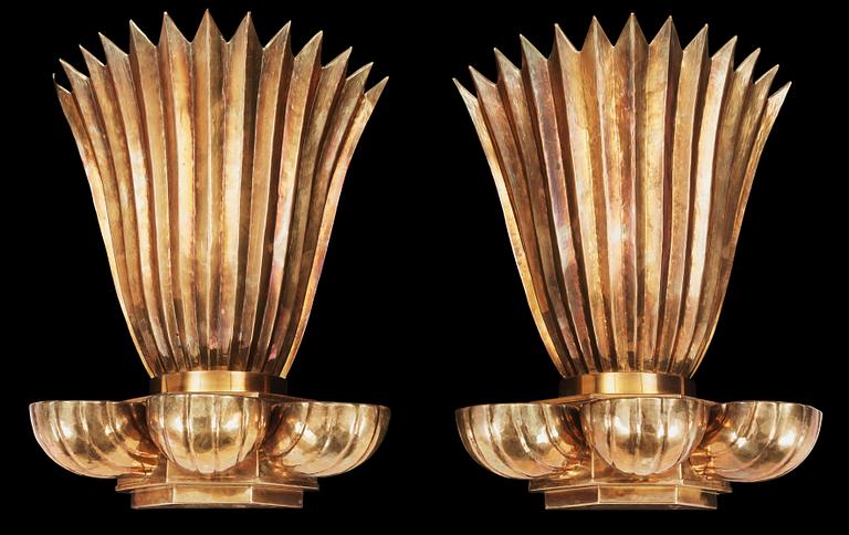 A pair of Lars Holmström Swedish Grace brass wall scones. Sweden 1920's.