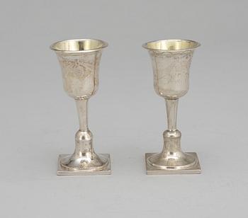 385. A pair of Swedish 19th century parcel-gilt chalices, makers mark of Adam Tillström, Växjö 1815.