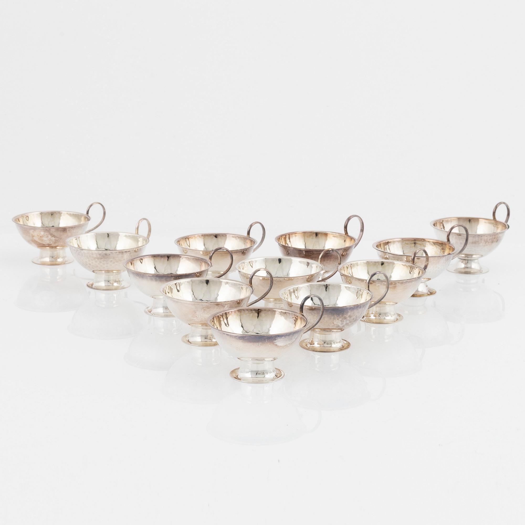 Twelve Swedish silver punsch mugs, including Gufa Gundefeldt & Falk, Gothenburg 1959.