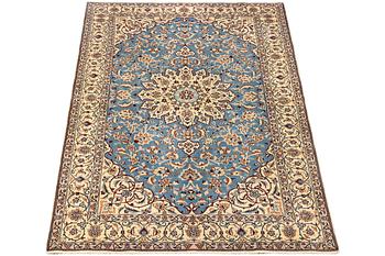 A Nain, part silk carpet, c. 196 x 120 cm.