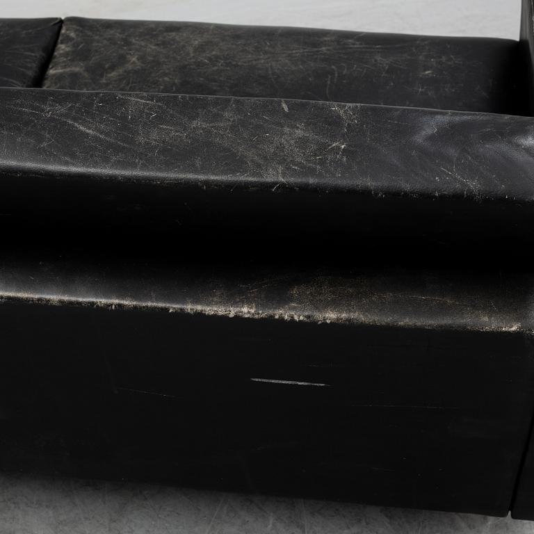 A 1960's leather covered sofa.