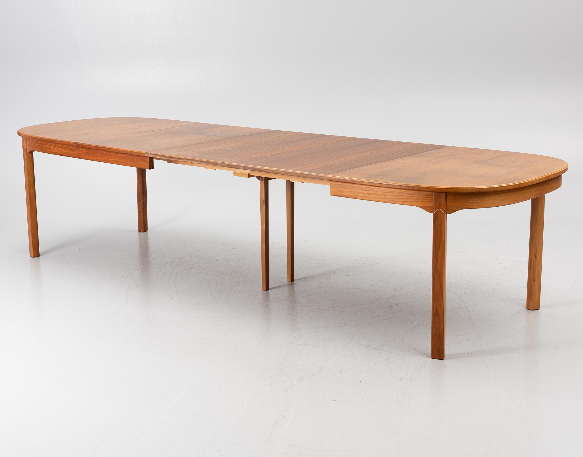 Carl Malmsten, Dining table with 2 armchairs and 6 chairs, 'Ambassador', Åfors Möbelfabrik, second half of the 20th century.