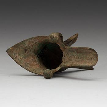 A bronze ritural tripod wine vessel 'Jue', presumably Shang dynasty, 12/11th Century BC.