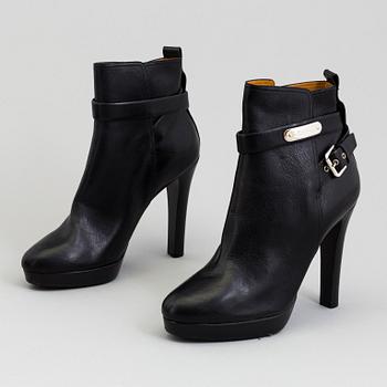 A pair of black leather bootie by Ralph Lauren.