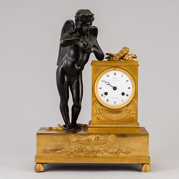 A French empire early 19th century mantel clock.
