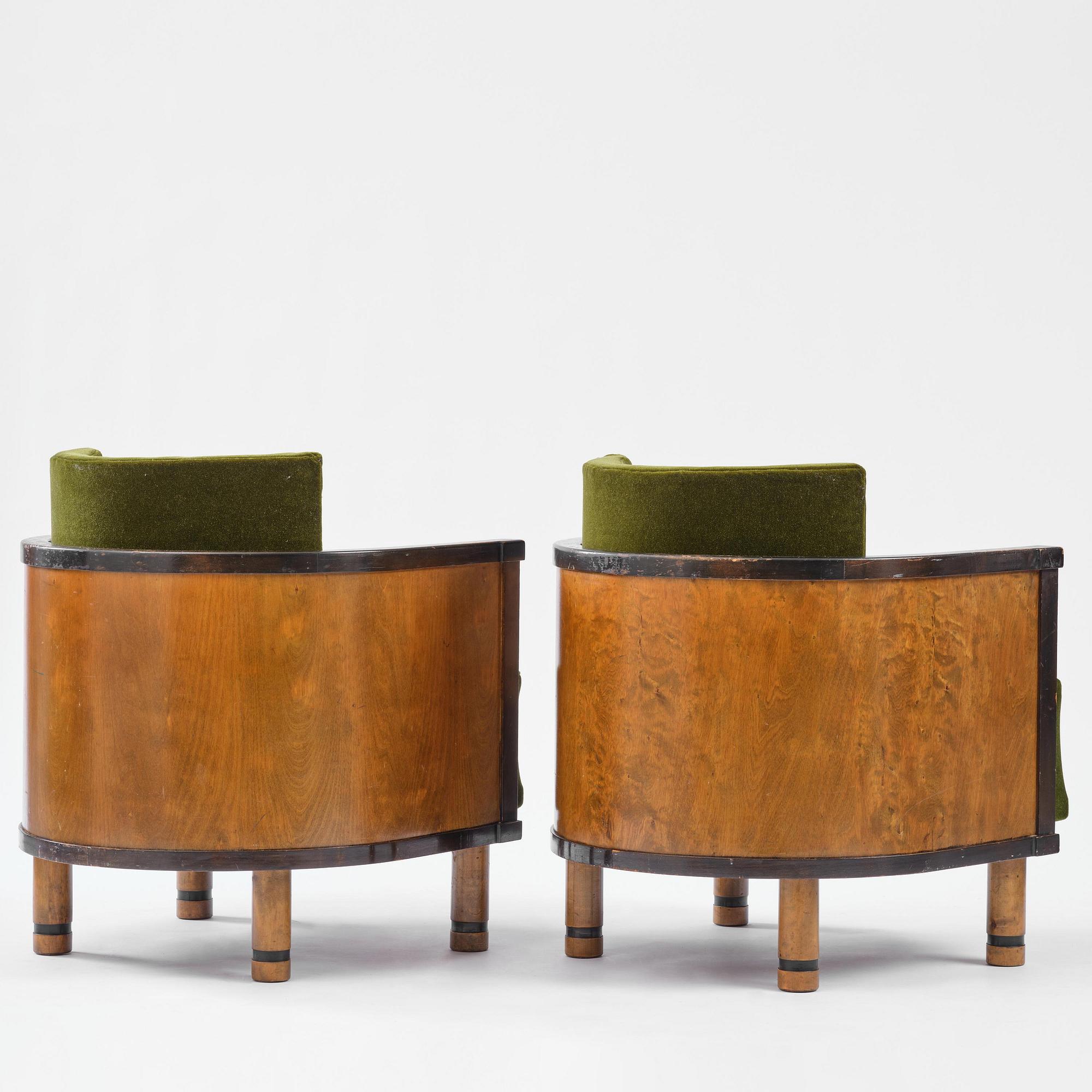 A pair of 1930s birch armchairs.