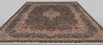 A Kirman Laver carpet, 'Millefleur', approx. 383 x 300 cm.