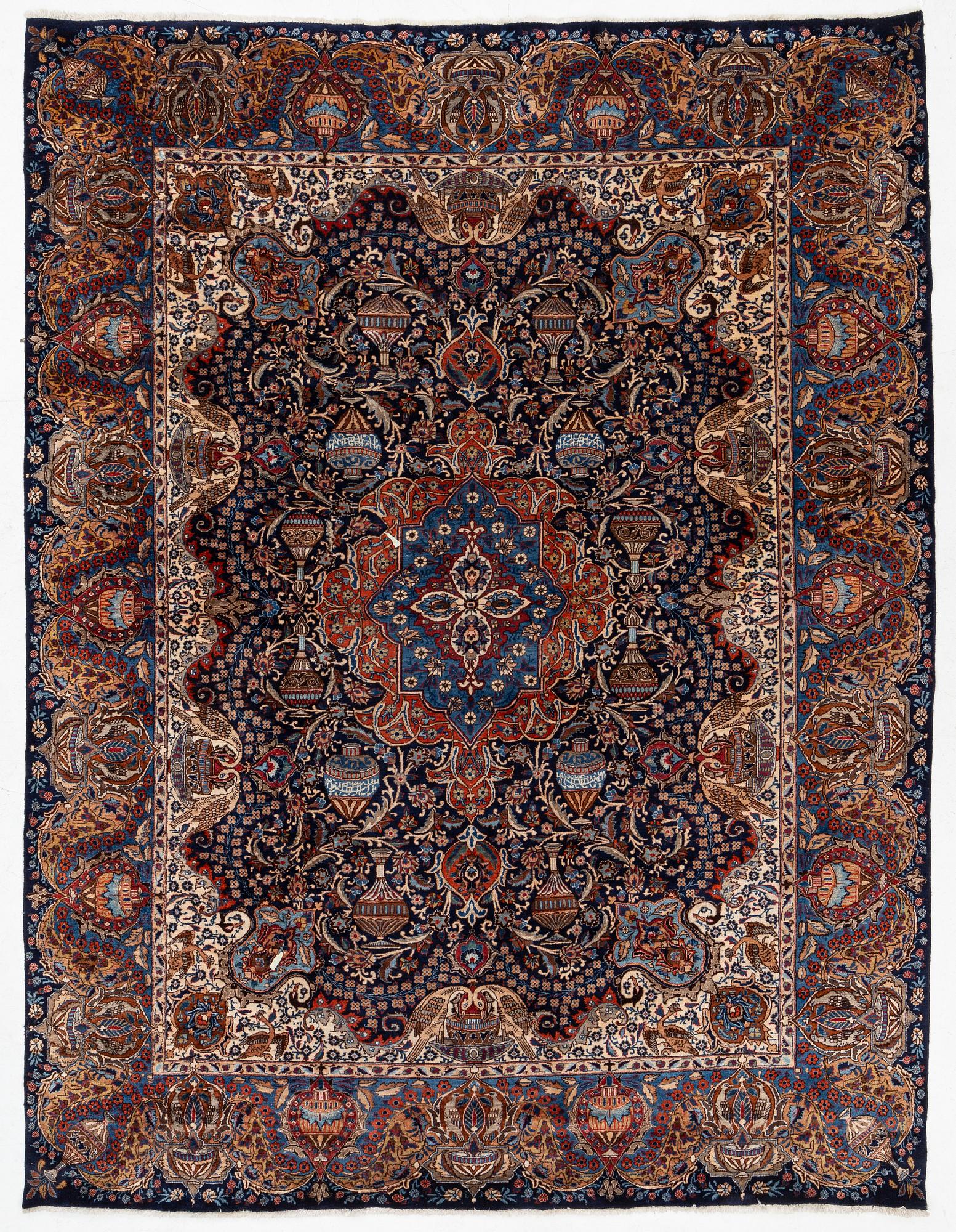 A Kashmar rug, c. 396 x 300 cm.