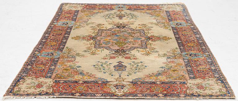A semi-antique Tabriz carpet, West Persian, c. 250 x 175 cm.