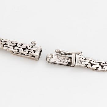 A bracelet set with five eight-cut diamonds.