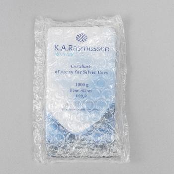 Silvertacka, 1000 gram finsilver, K.A. Rasmussen, Norge.