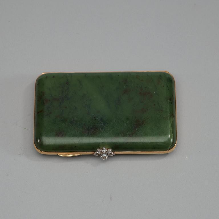 An early 20th century nefrit, gold and dimond cigarette-case, unmarked.