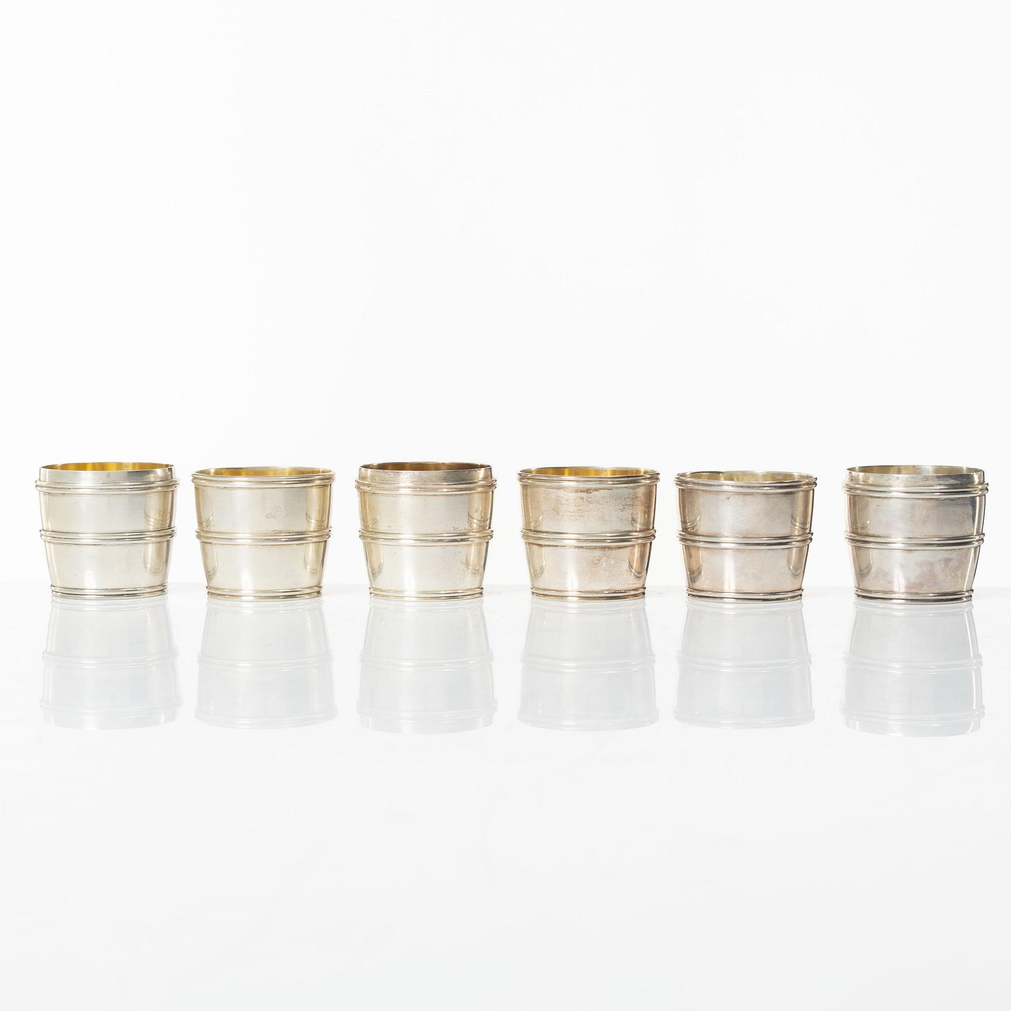 Six silver vodka cups, in the form of three detachable barrels, including mark of CF Carlman, Stockholm 1924.