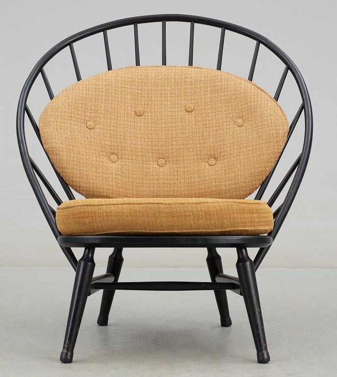 A Sven Engström & Gunnar Myrstrand black lacquered easy chair, 'Bågen', Nässjö Stolfabrik, Sweden 1950's.