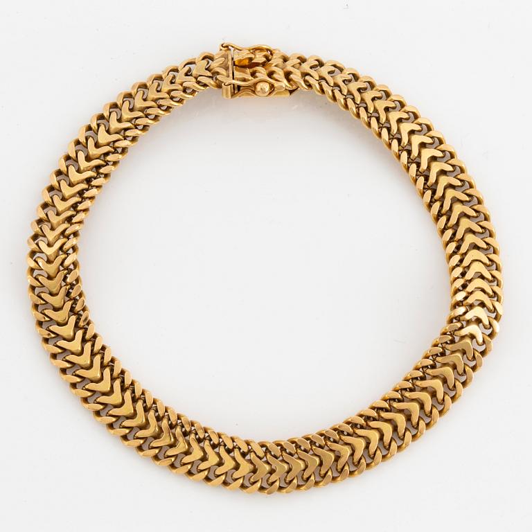 ARMBAND, 18K guld, ormlänk.