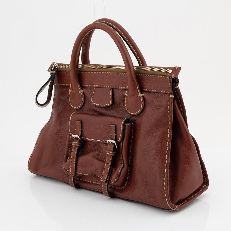 Chloé, a brown leather handbag.