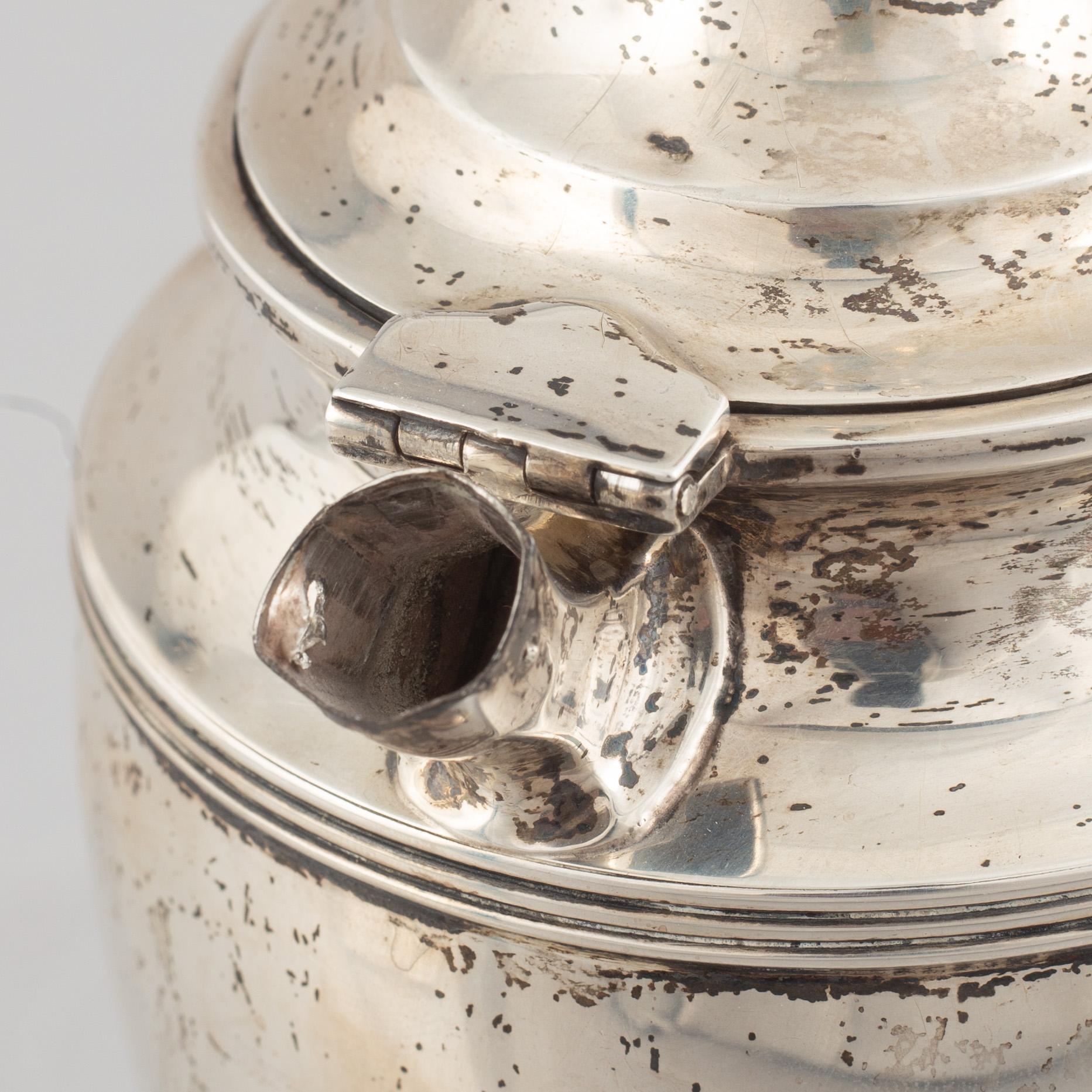 A sterling silver coffee pot, circa 1900.