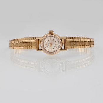 DAMARMBANDSUR, 18K guld, Tissot. Vikt 27,6 gram.