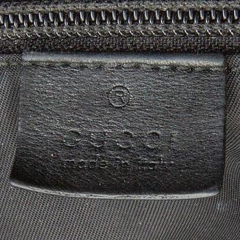 A Techno Web Stripe Canvas Tote  by Gucci.