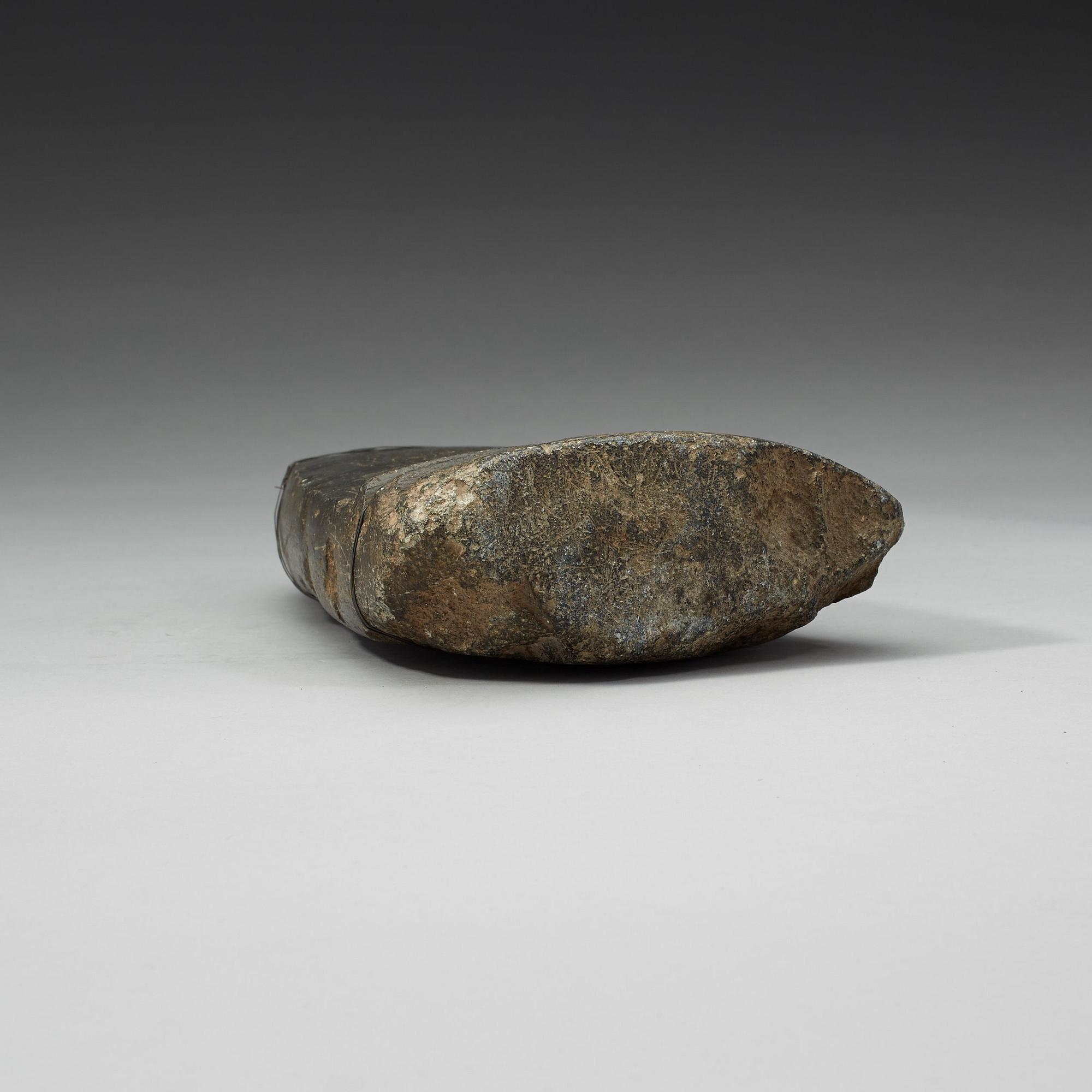 A carved Tibetan votive placque.
