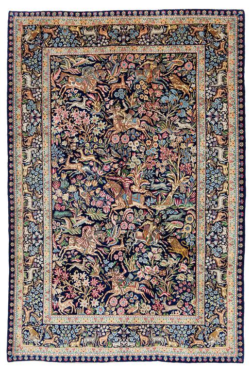 A semi-antique Kirman carpet, south eastern Iran, c. 278 x 188 cm.