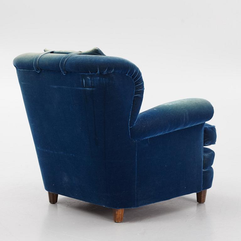 Josef Frank, a model 336 lounge chair for Firma Svenskt Tenn.